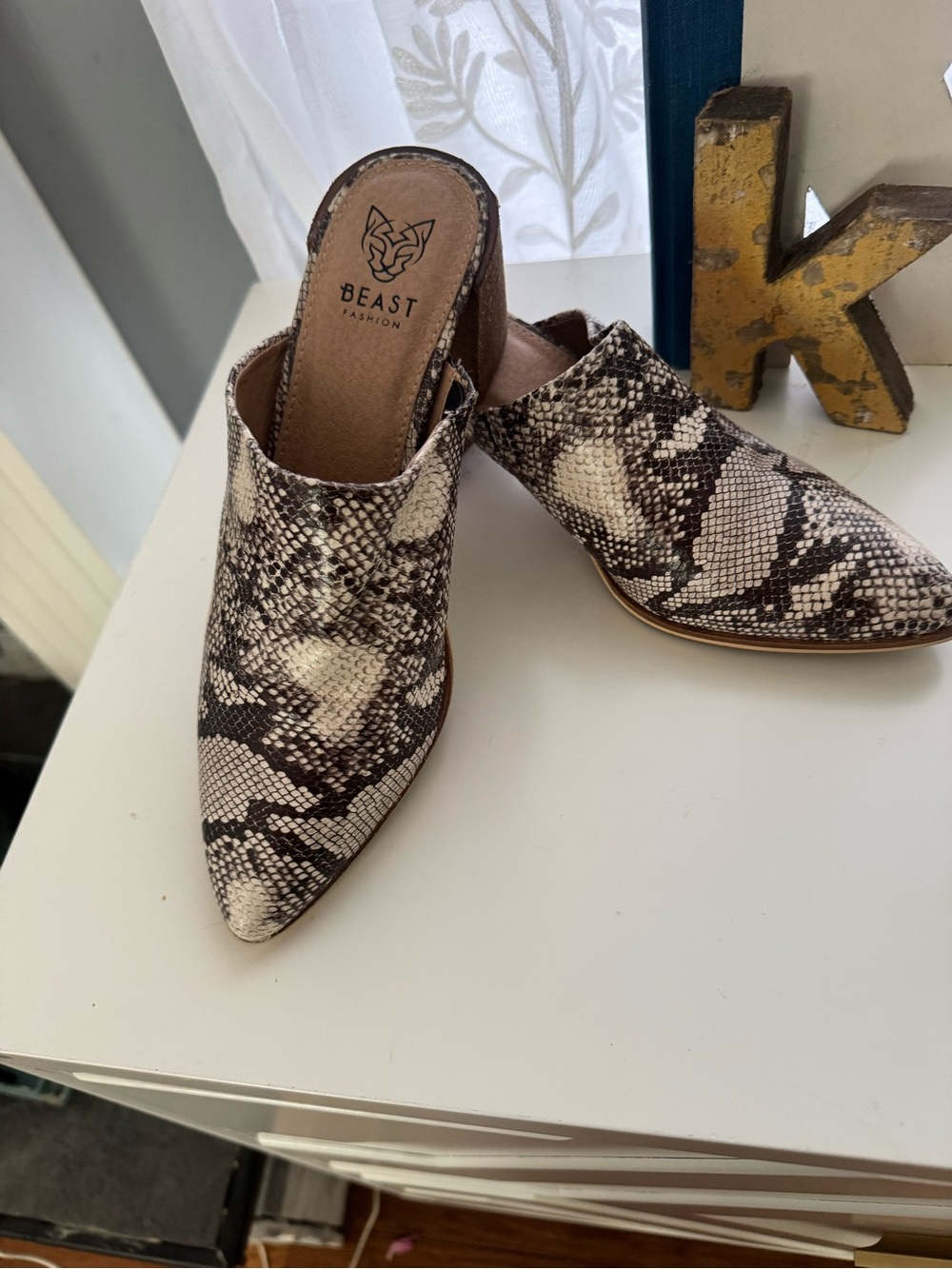 BEAST FASHION Snake-Print Pointed Toe Mules in Black and Cream